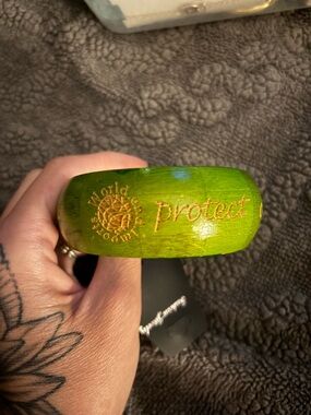 Green Wooden Bangle Bracelet with 'Protect Our World ' Engraving